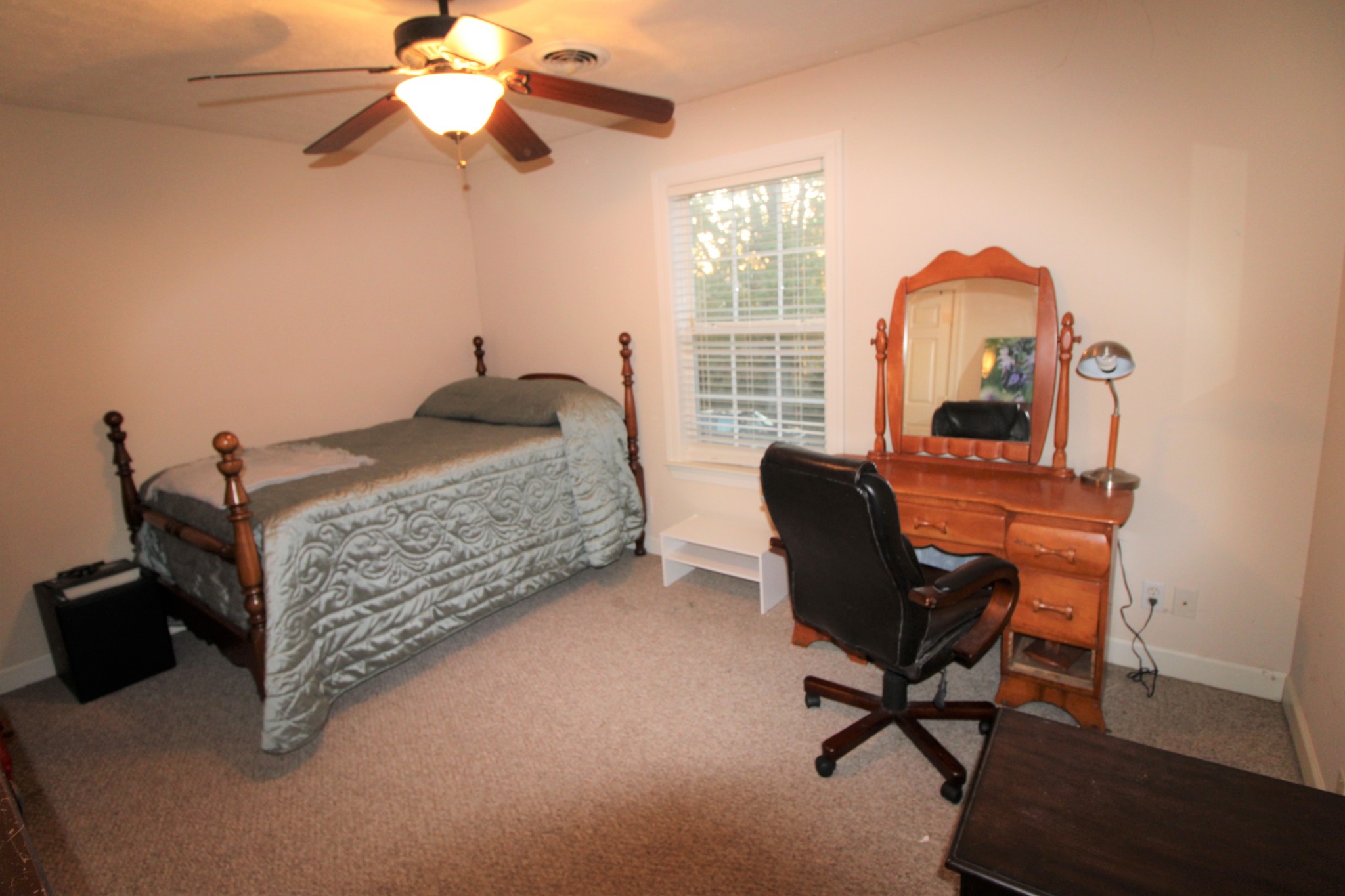 248 West Hester Road Cottontown, TN 37048 - Photo 18 of 22 a bedroom with a bed and a chandelier