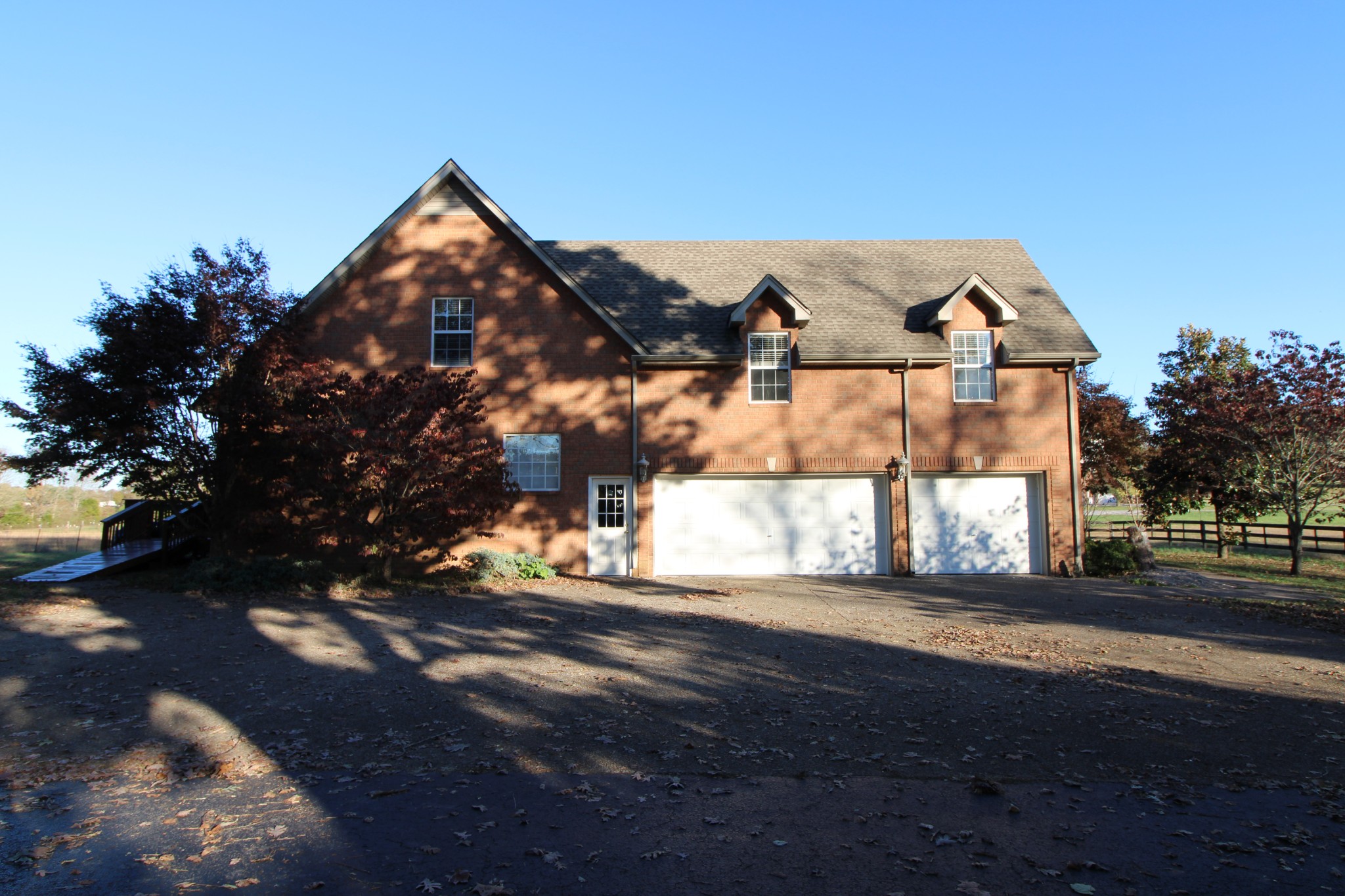 248 West Hester Road Cottontown, TN 37048 - Photo 20 of 22 a front view of a house with a yard