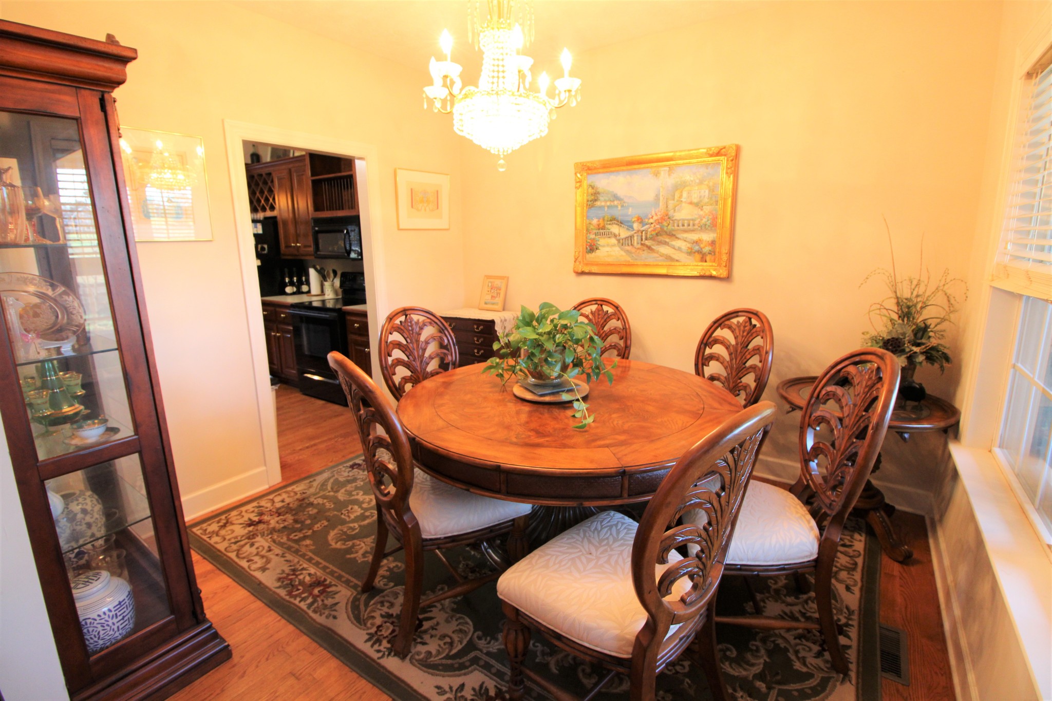 248 West Hester Road Cottontown, TN 37048 - Photo 7 of 22 a view of a dining room with furniture wooden floor and a rug