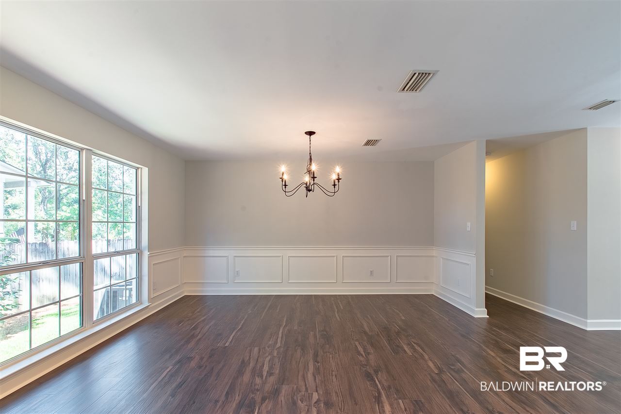 121 Pineridge Road Daphne, AL 36526 - Photo 16 of 41 Library paneling in DR