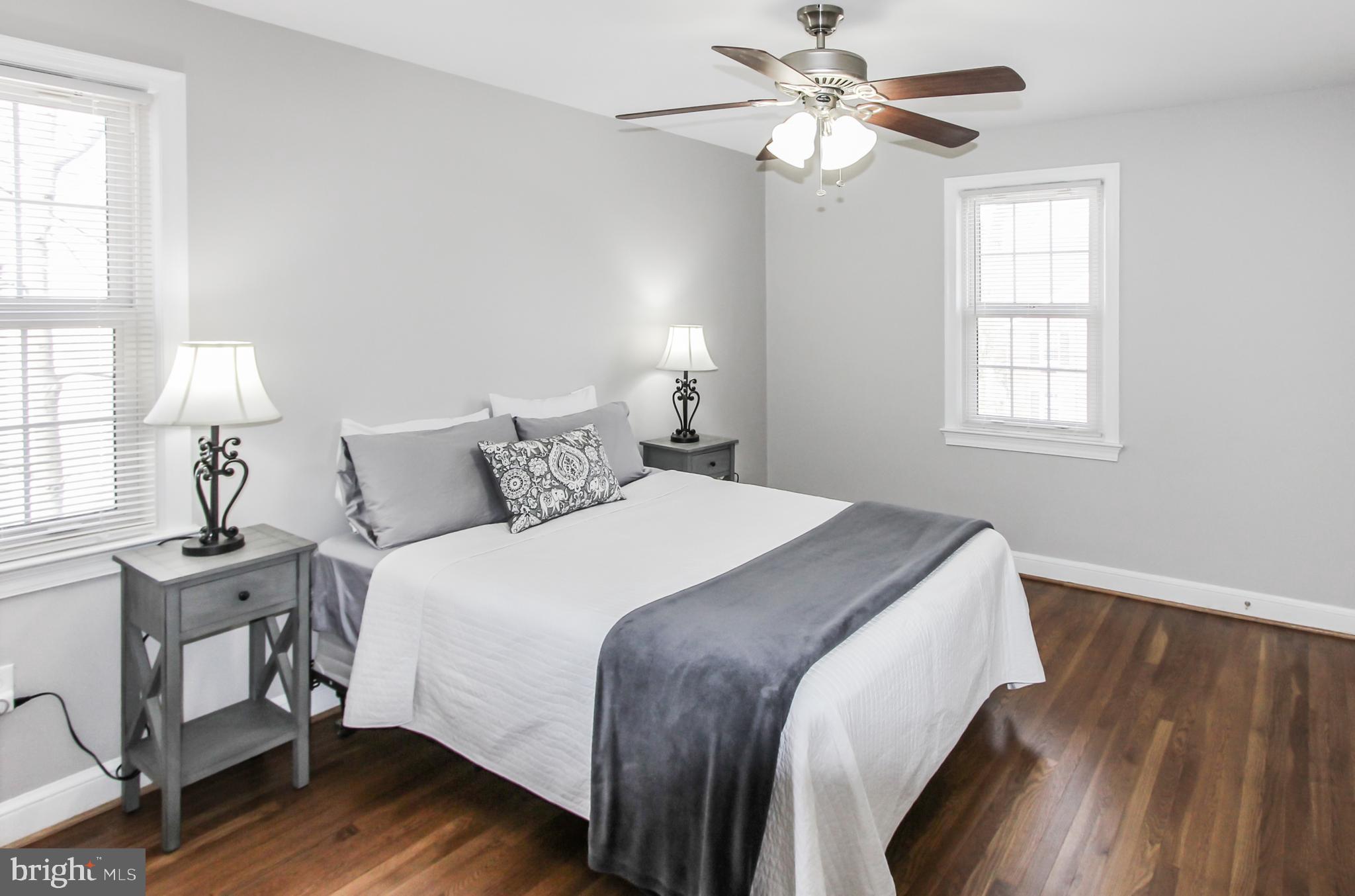 9108 Eton Road Silver Spring, MD 20901 - Photo 14 of 43 Master bedroom w/ ceiling fan & overhead lights.