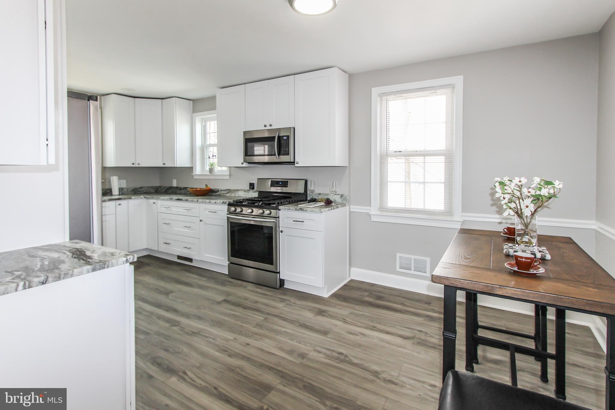 9108 Eton Road Silver Spring, MD 20901 - Photo 4 of 43 Kitchen expanded & renovated down to studs.