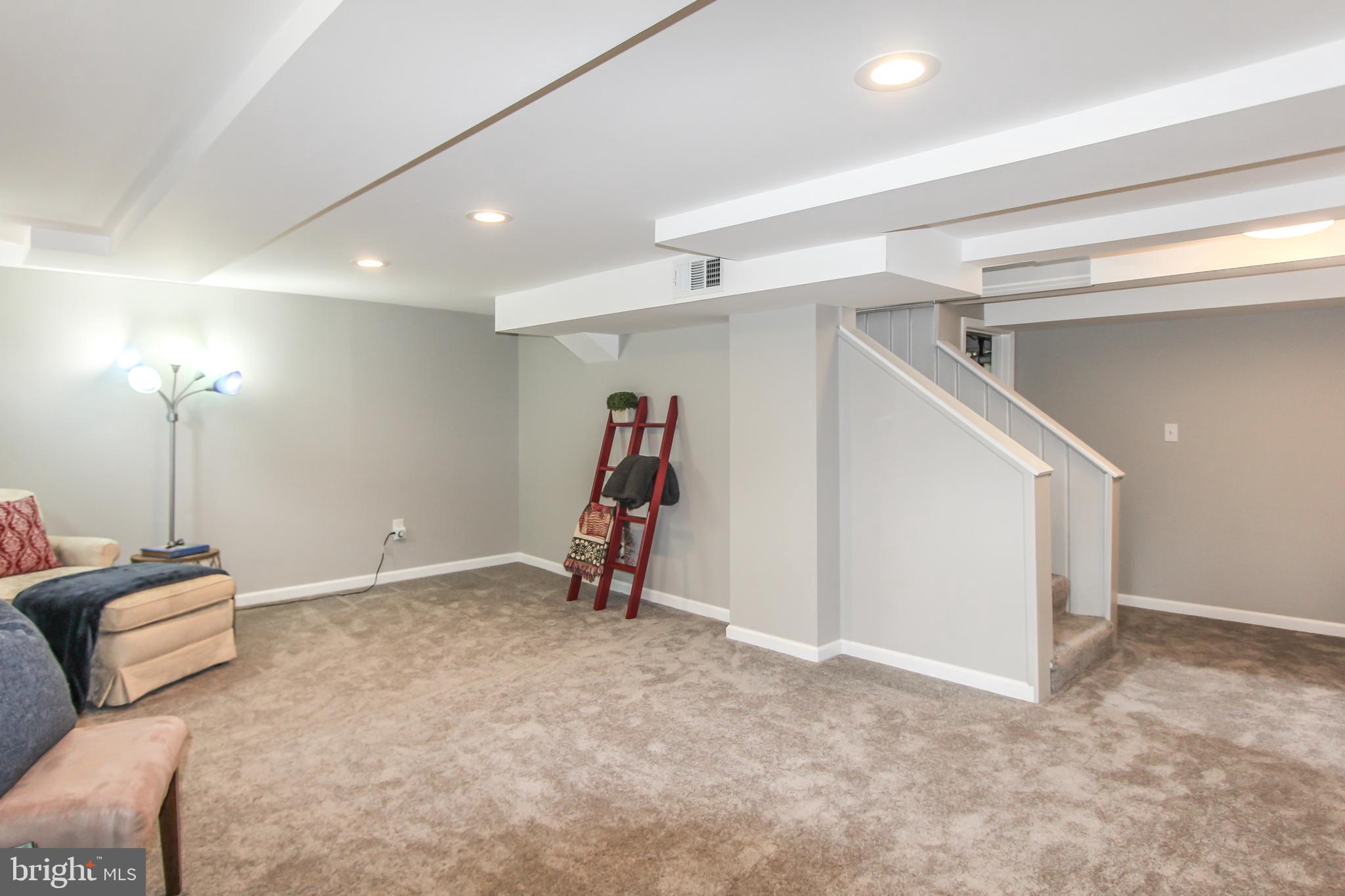 9108 Eton Road Silver Spring, MD 20901 - Photo 31 of 43 Freshly painted recreation room.