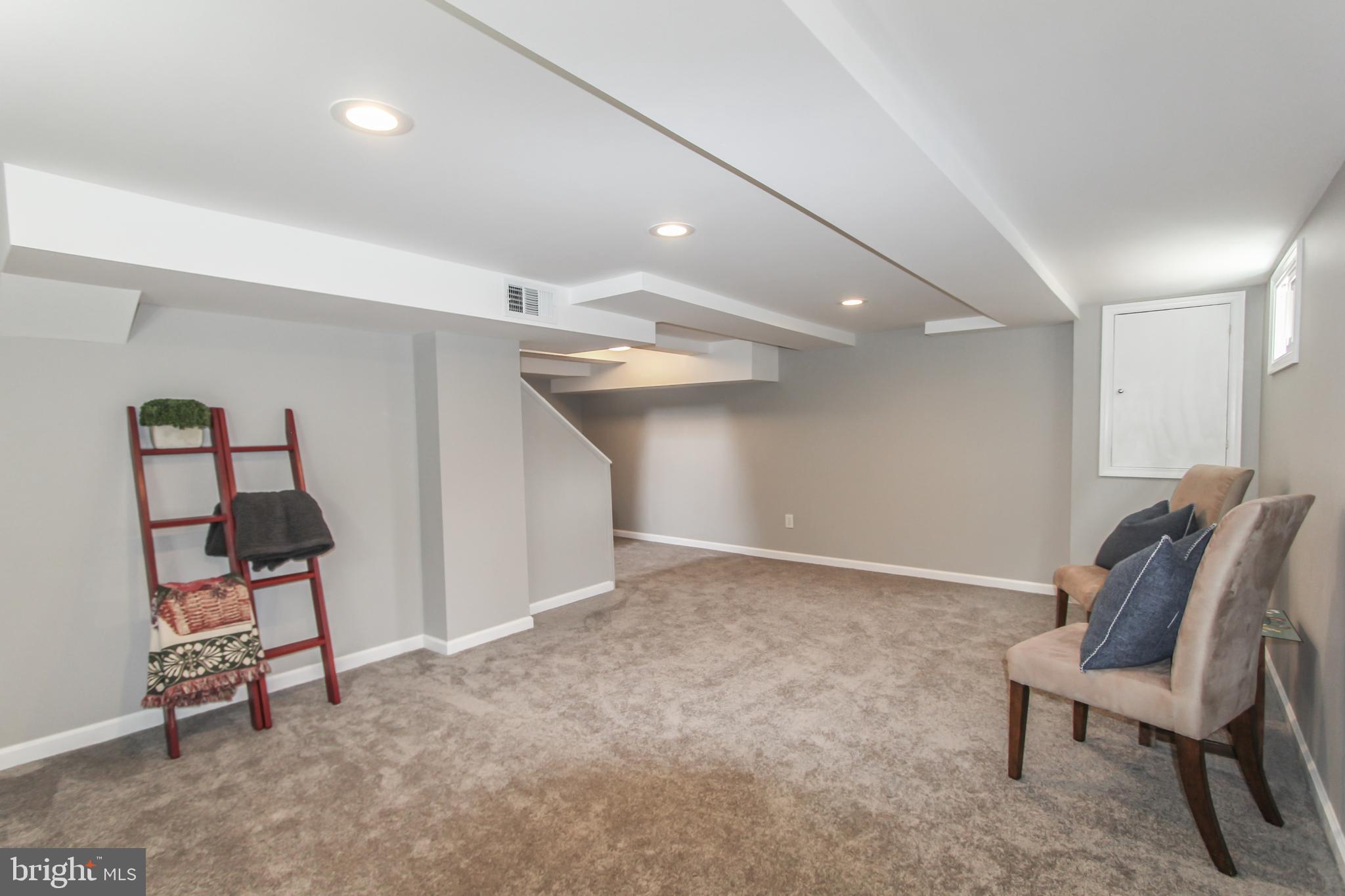 9108 Eton Road Silver Spring, MD 20901 - Photo 32 of 43 Rec rm/BR4 or BR5/office w/ recessed lights.