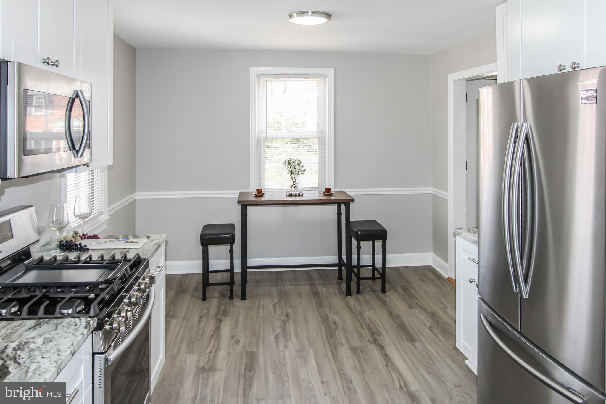 9108 Eton Road Silver Spring, MD 20901 - Photo 7 of 43 New granite & new SS appliances. Gas cooking!!