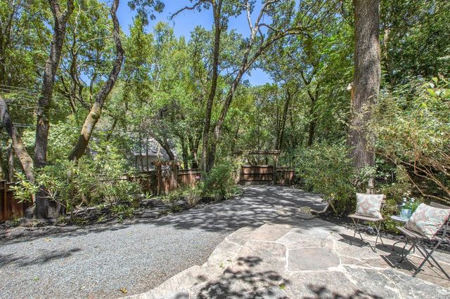 a backyard of a house with lots of green space
