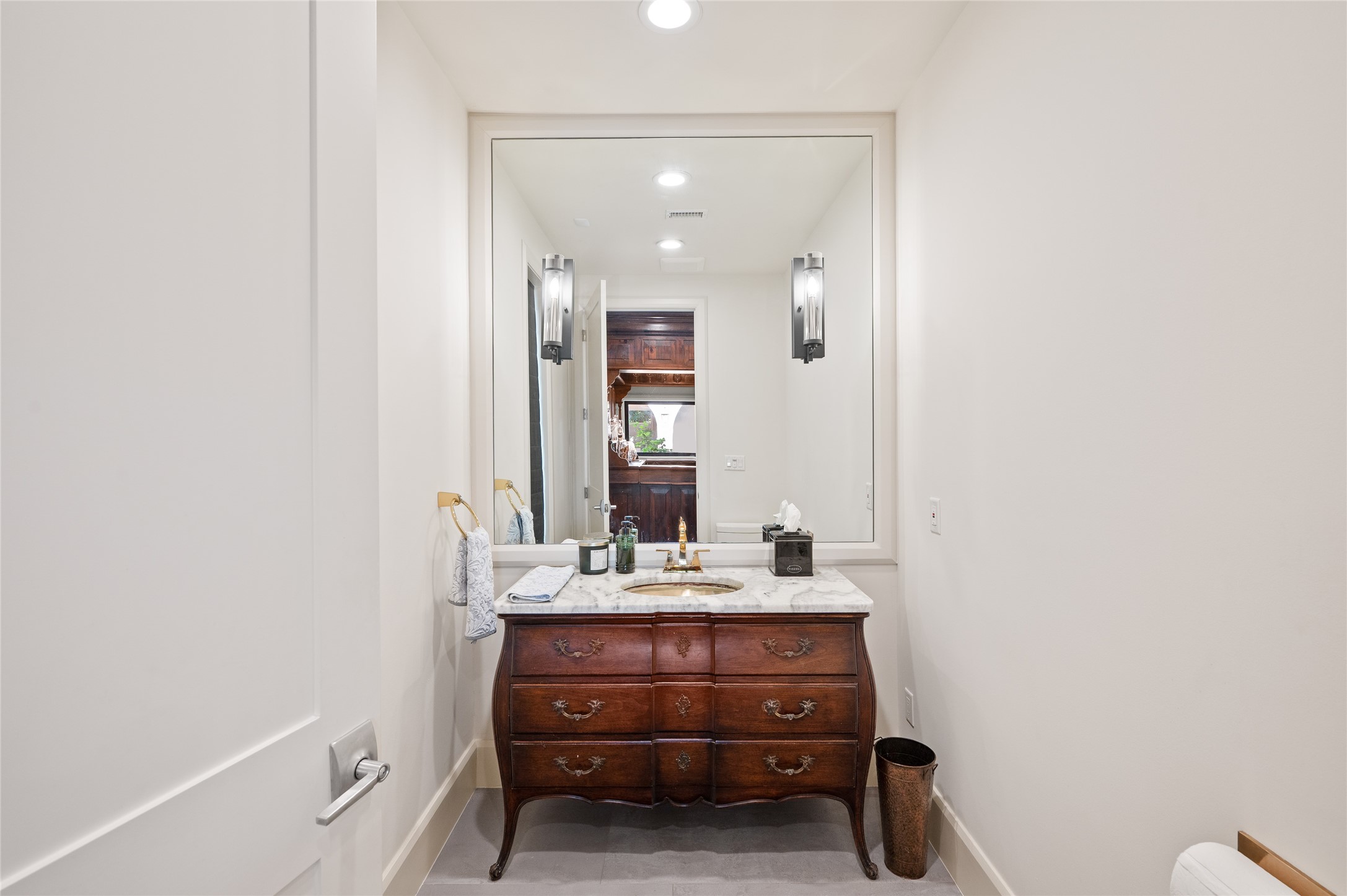 11518 Shadow Way Street Houston, TX 77024 - Photo 18 of 50 One of the home’s stylish powder rooms, featuring thoughtful finishes and standout design elements.