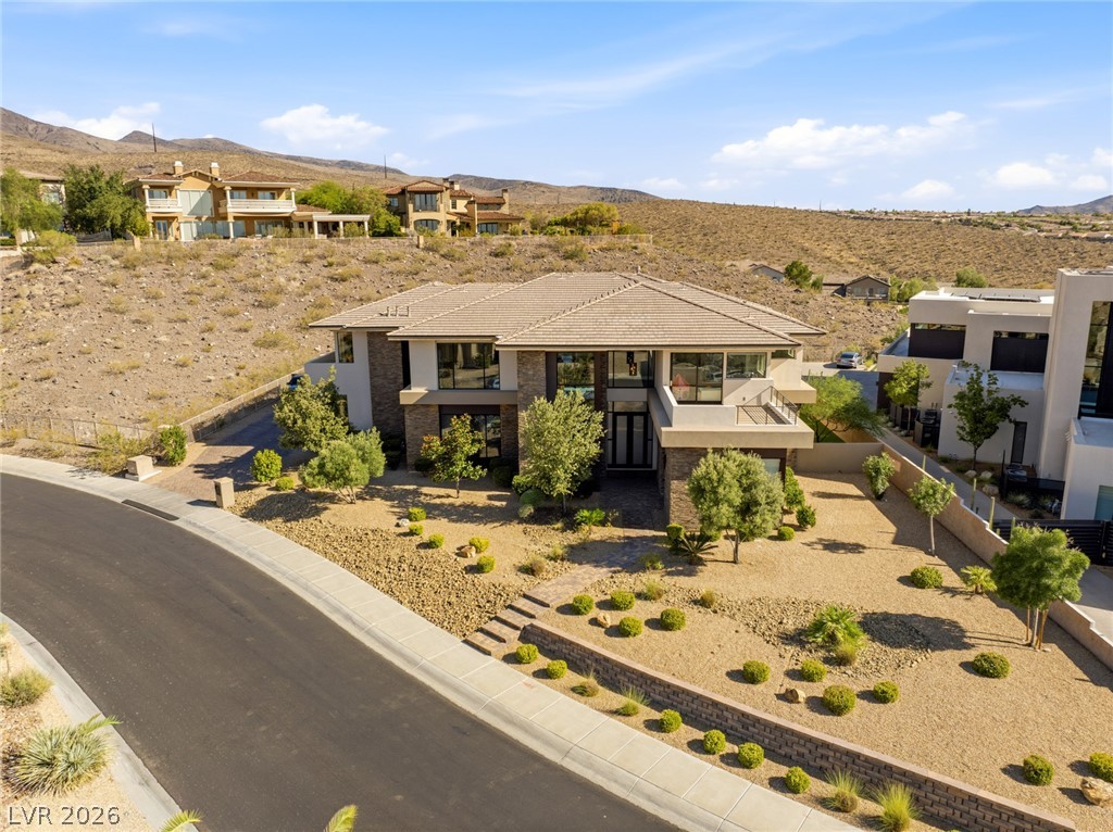 5 Crystal Tree Pass Henderson, NV 89052 - Photo 48 of 67 Experience modern living in this desert oasis, boasting distinctive architecture and unparalleled mountain views.
