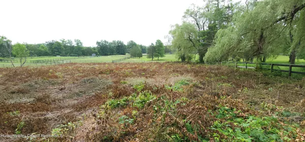 a view of an outdoor space with a lake view