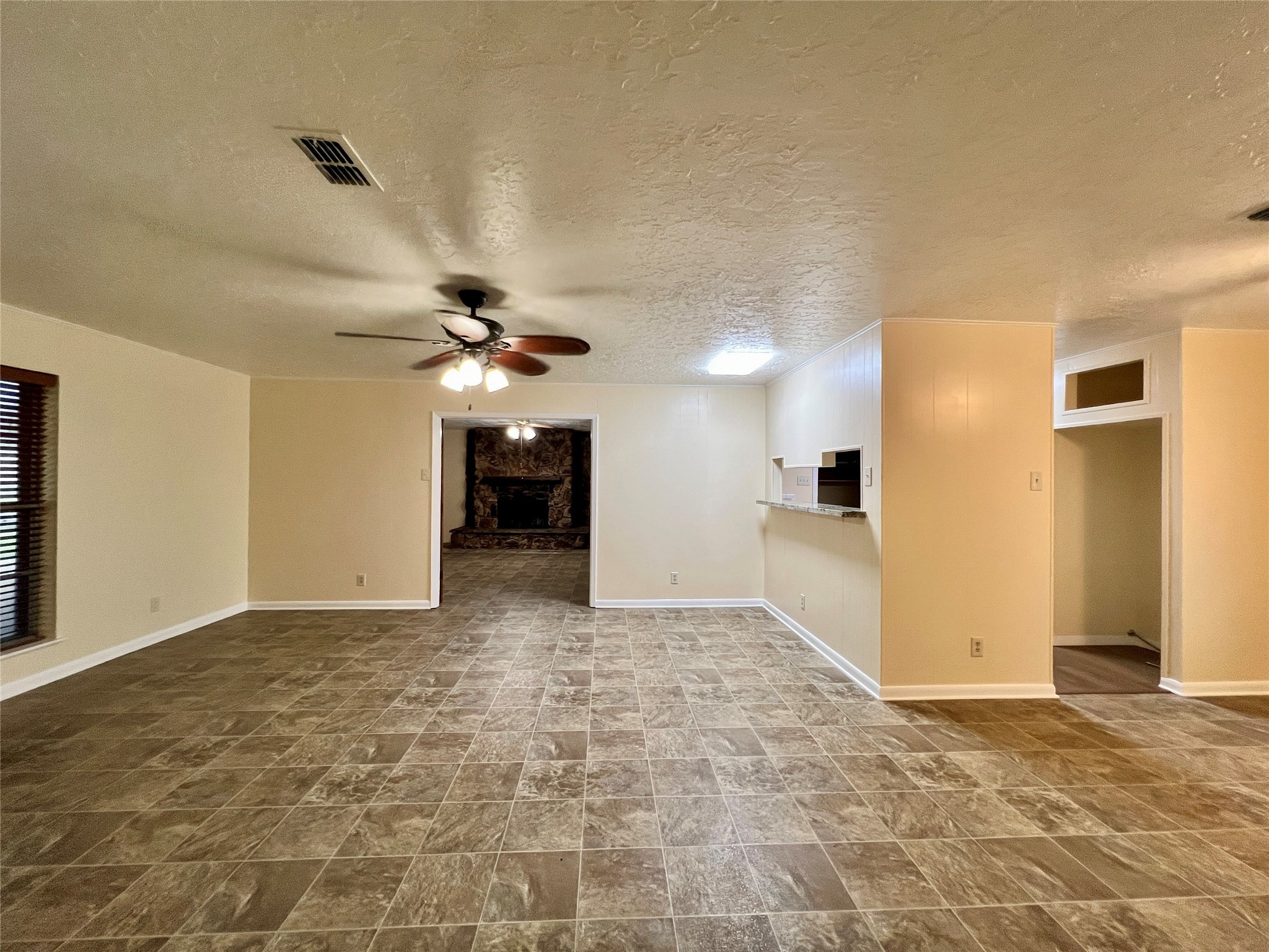 8610 Overhill Lane Beaumont, TX 77707 - Photo 7 of 20 a view of a kitchen with a sink and a refrigerator