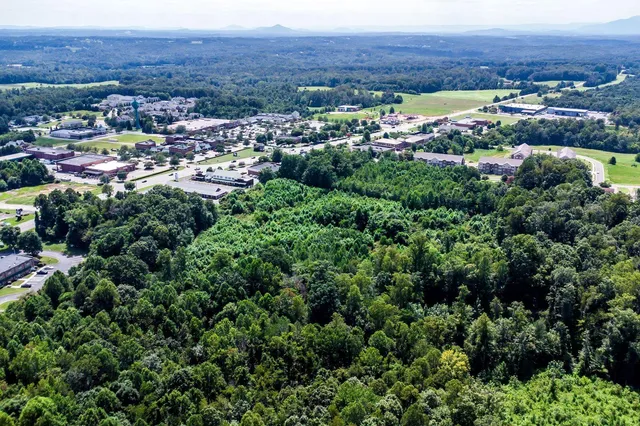 an aerial view of residential house and outdoor space