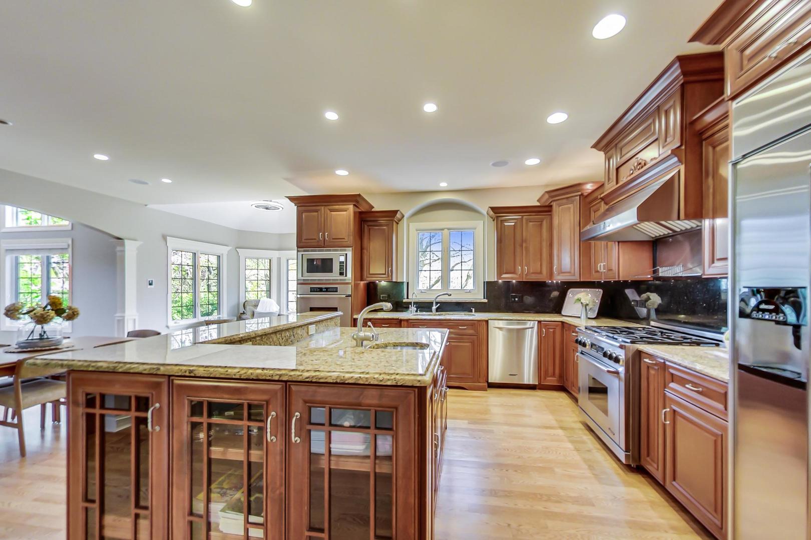 3312 Keller Lane Naperville, IL 60565 - Photo 11 of 50 a kitchen with stove a sink and a refrigerator