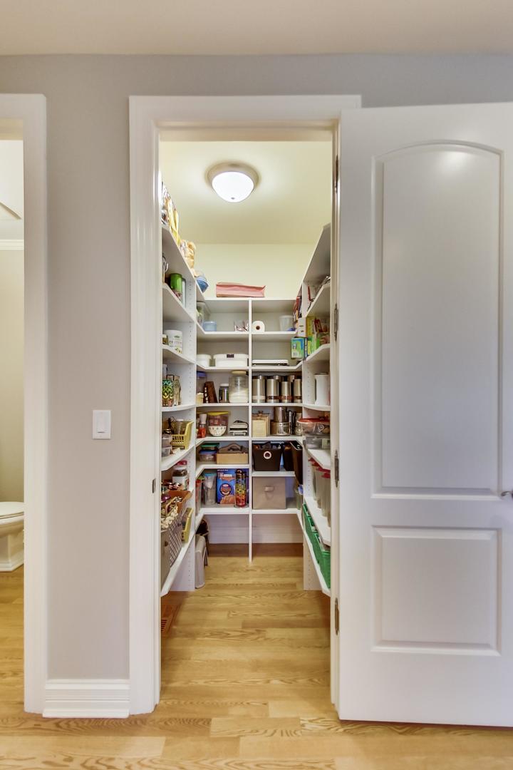 3312 Keller Lane Naperville, IL 60565 - Photo 14 of 50 a view of walk in closet with clothes and shoes