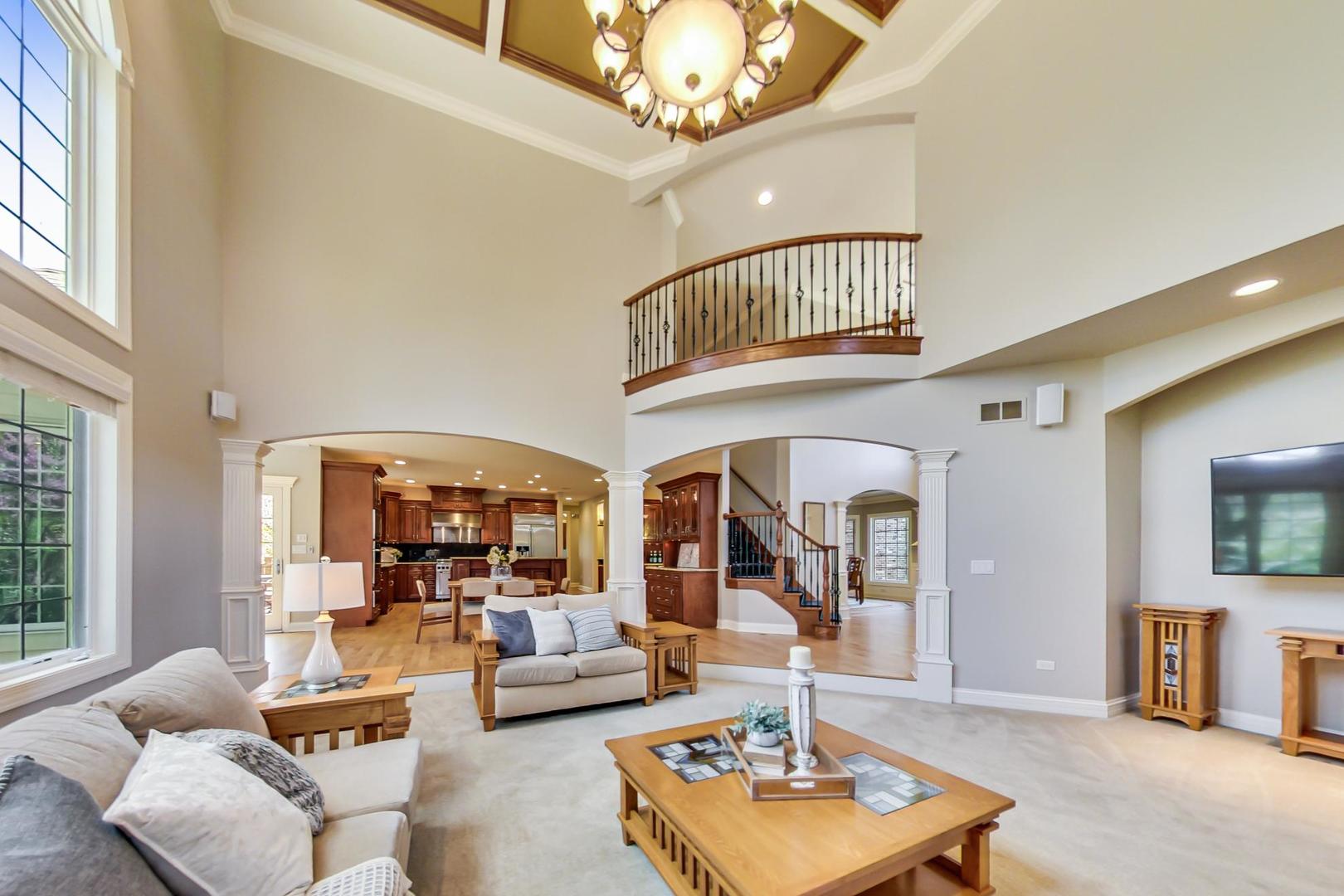 3312 Keller Lane Naperville, IL 60565 - Photo 20 of 50 a living room with furniture a rug and a large window