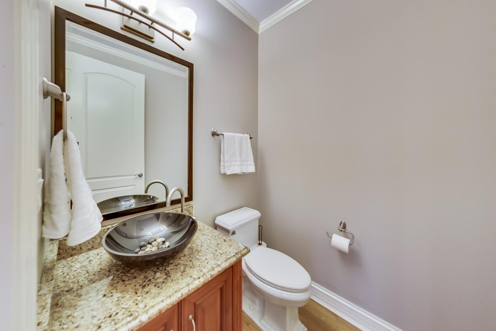 3312 Keller Lane Naperville, IL 60565 - Photo 21 of 50 a bathroom with a granite countertop sink and a mirror