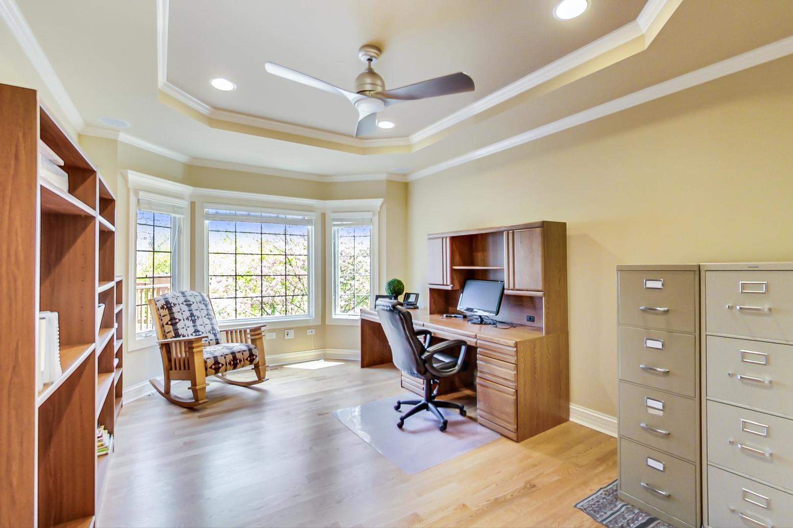 3312 Keller Lane Naperville, IL 60565 - Photo 22 of 50 a view of a livingroom with workspace and a window