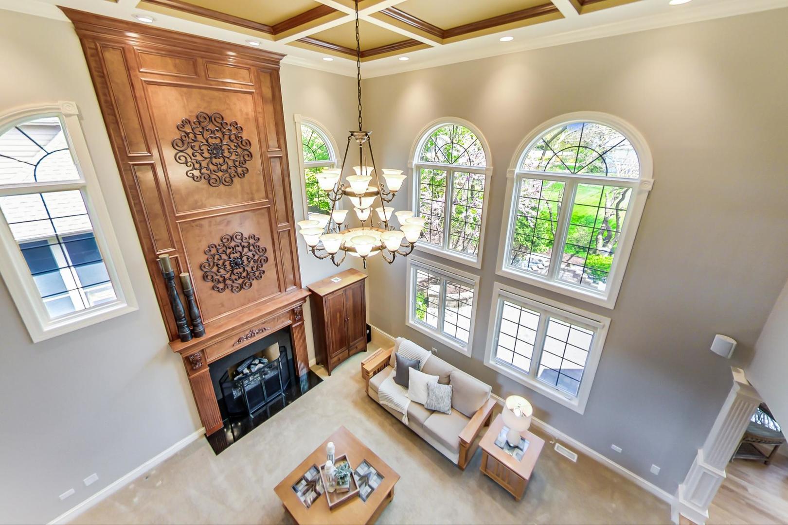 3312 Keller Lane Naperville, IL 60565 - Photo 23 of 50 a living room with furniture and a floor to ceiling window