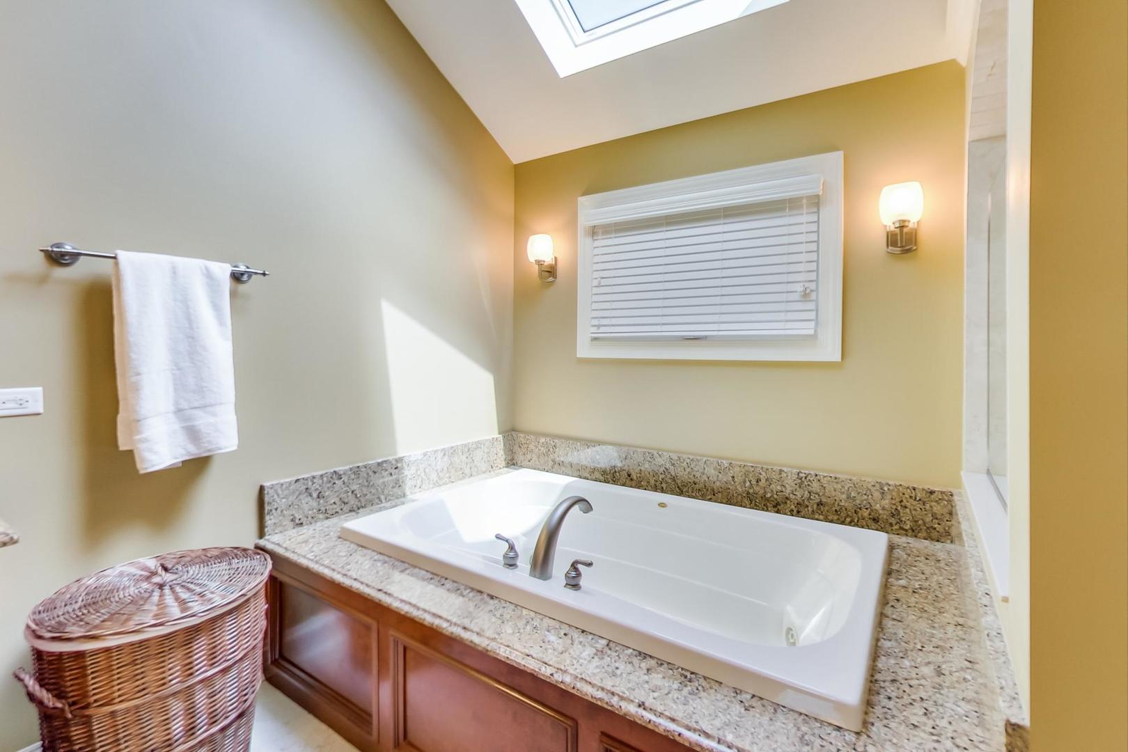 3312 Keller Lane Naperville, IL 60565 - Photo 27 of 50 a bathroom with a granite countertop sink and a mirror