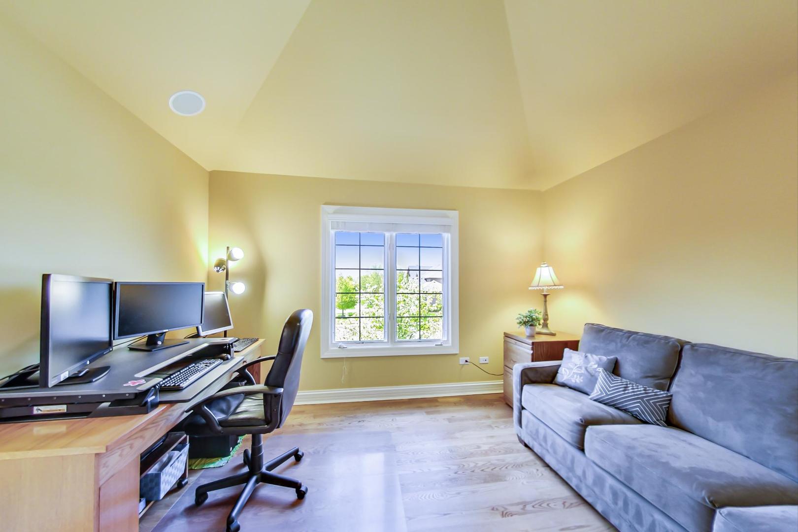 3312 Keller Lane Naperville, IL 60565 - Photo 29 of 50 a view of a livingroom with workspace and a window