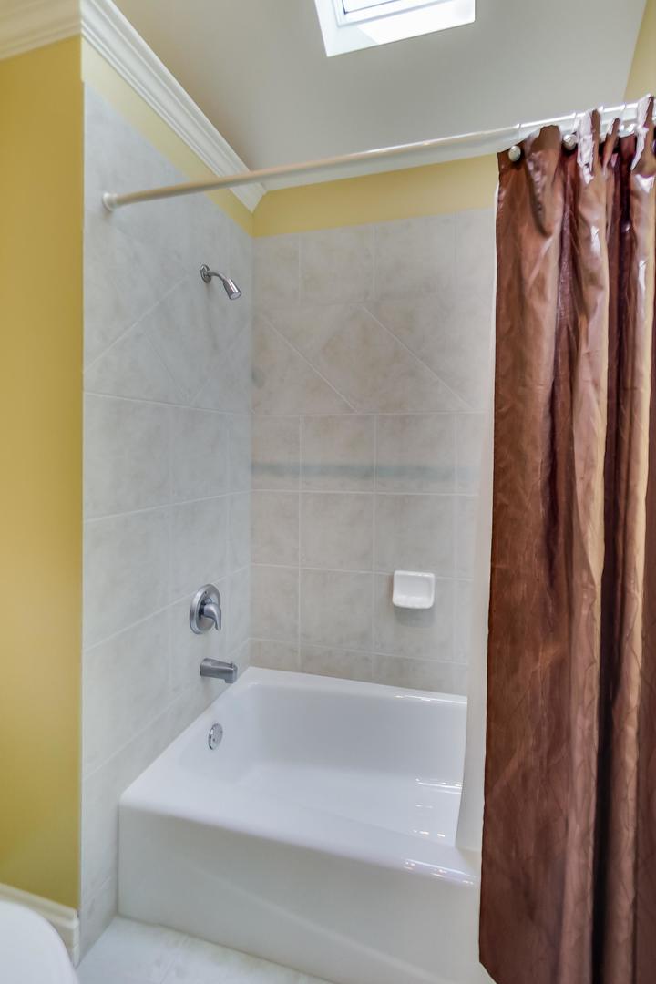 3312 Keller Lane Naperville, IL 60565 - Photo 31 of 50 a bathroom with a shower and a bathtub