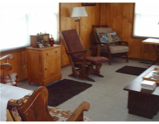 349 Magalloway Plt Wilson Mills Road Rangeley, ME 04970 - Photo 3 of 9 Living Room.