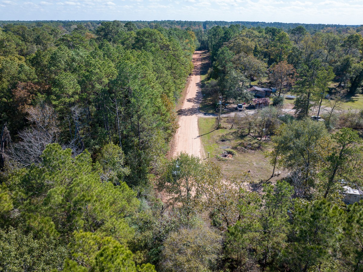 0 Mendez Road Willis, TX 77378 - Photo 15 of 19 an aerial view of residential house with outdoor space and trees all around