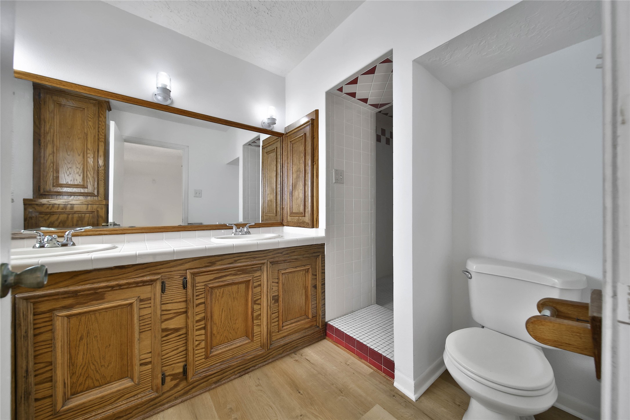 15418 Willis Way Conroe, TX 77384 - Photo 24 of 41 Upstairs bathroom with huge walk-in shower, dual showerheads.