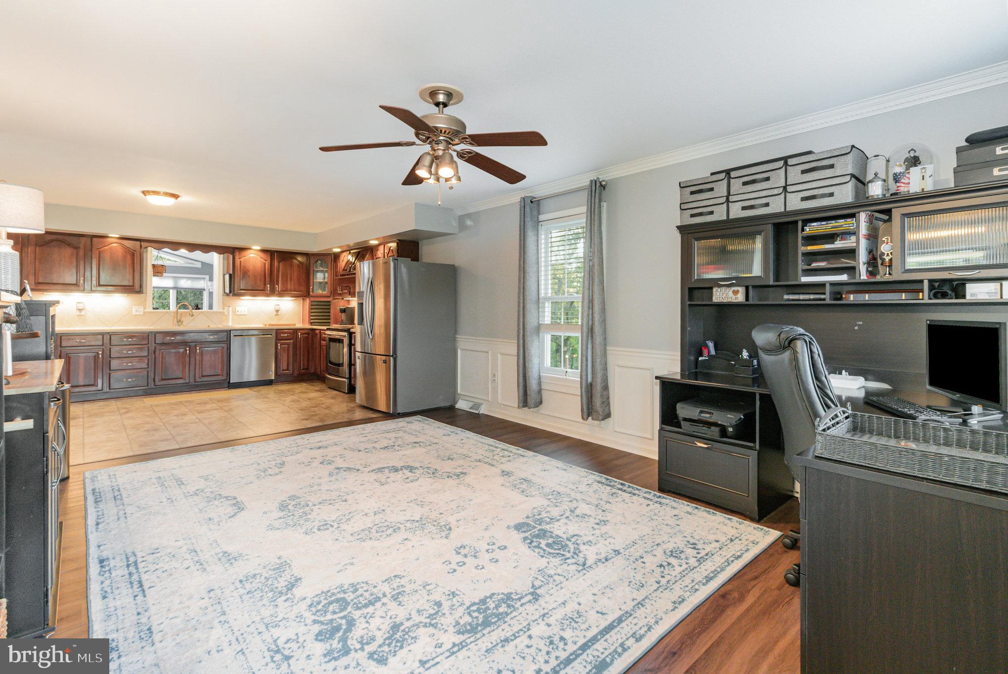 124 South Ridge Road Boiling Springs, PA 17007 - Photo 13 of 56 a kitchen with kitchen island a stove sink and microwave