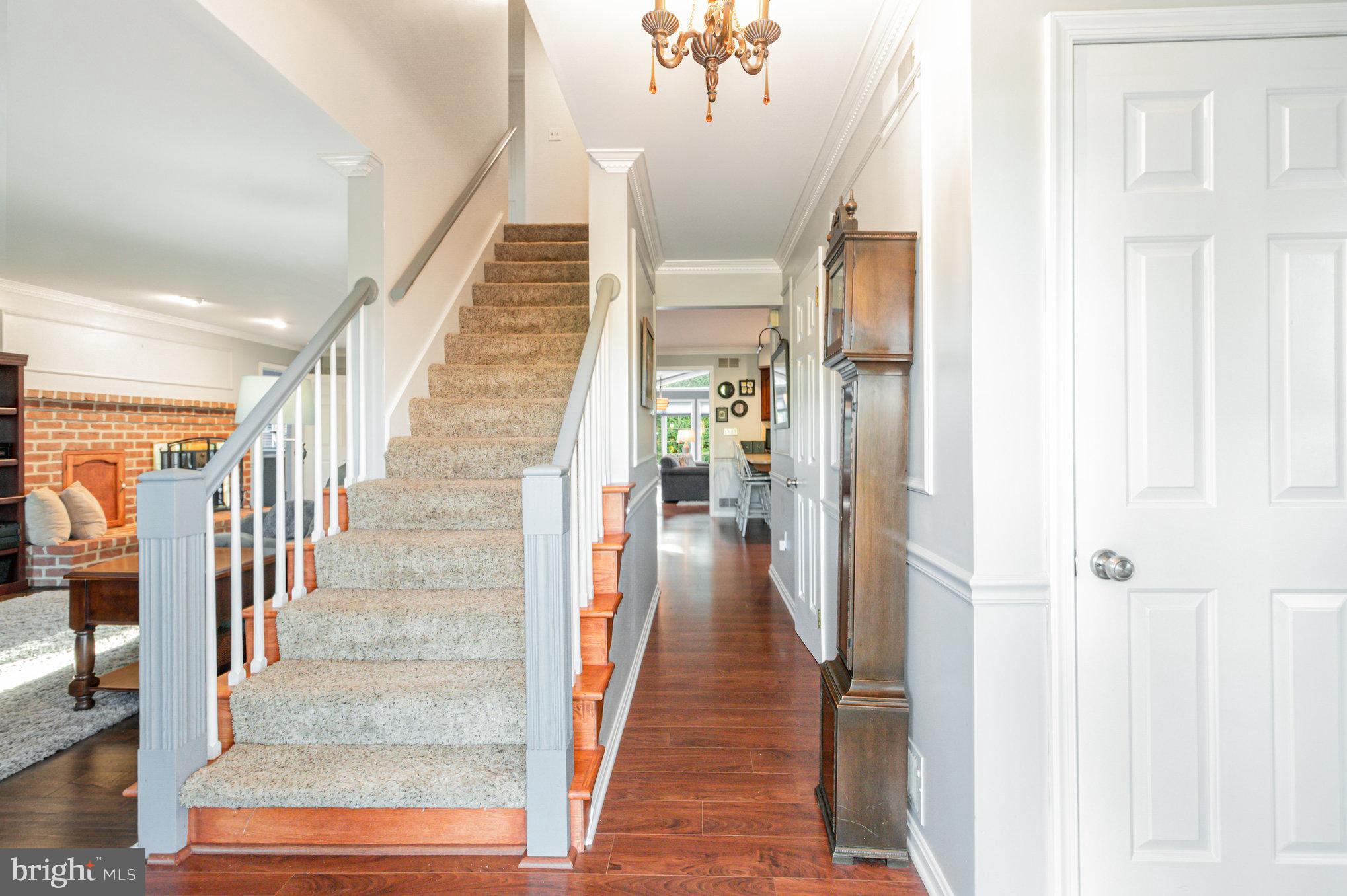 124 South Ridge Road Boiling Springs, PA 17007 - Photo 17 of 56 a view of a hallway with wooden floor and staircase