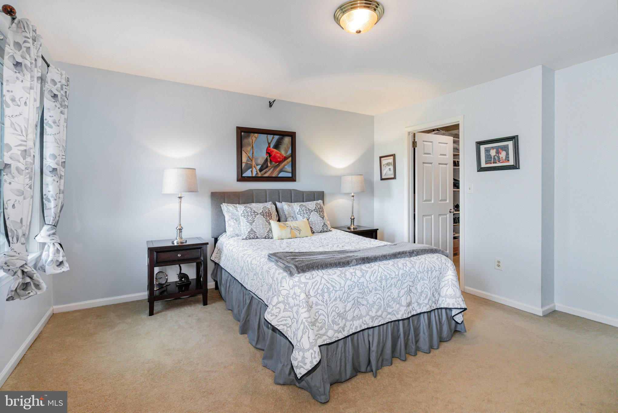 124 South Ridge Road Boiling Springs, PA 17007 - Photo 19 of 56 a bedroom with a bed and painting on the wall