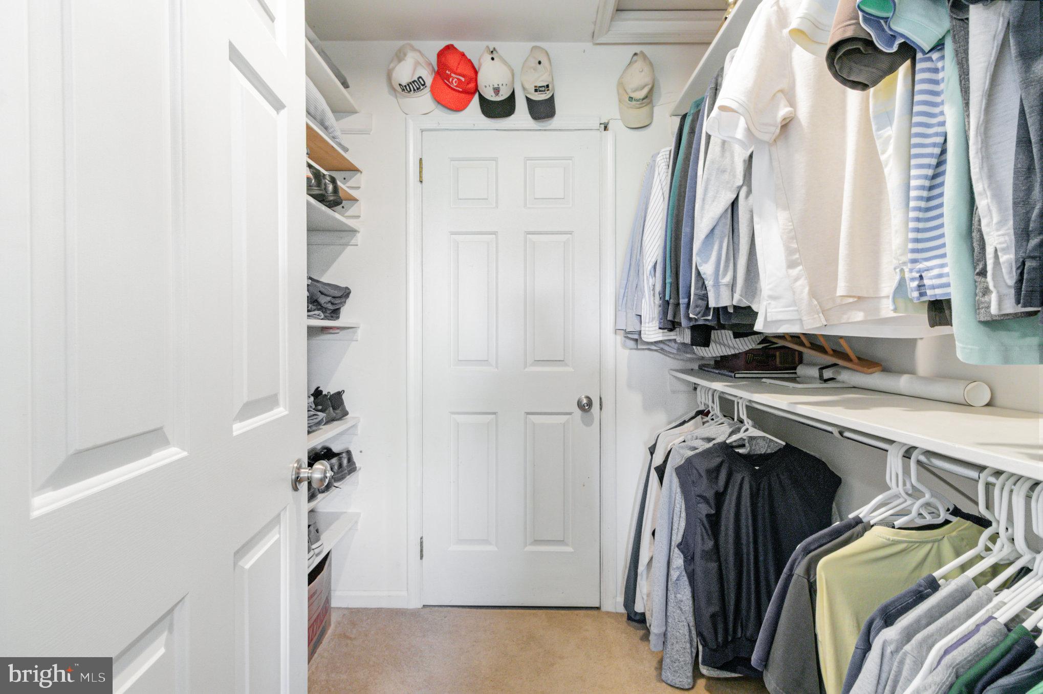 124 South Ridge Road Boiling Springs, PA 17007 - Photo 21 of 56 a view of walk in closet with clothes and shoes