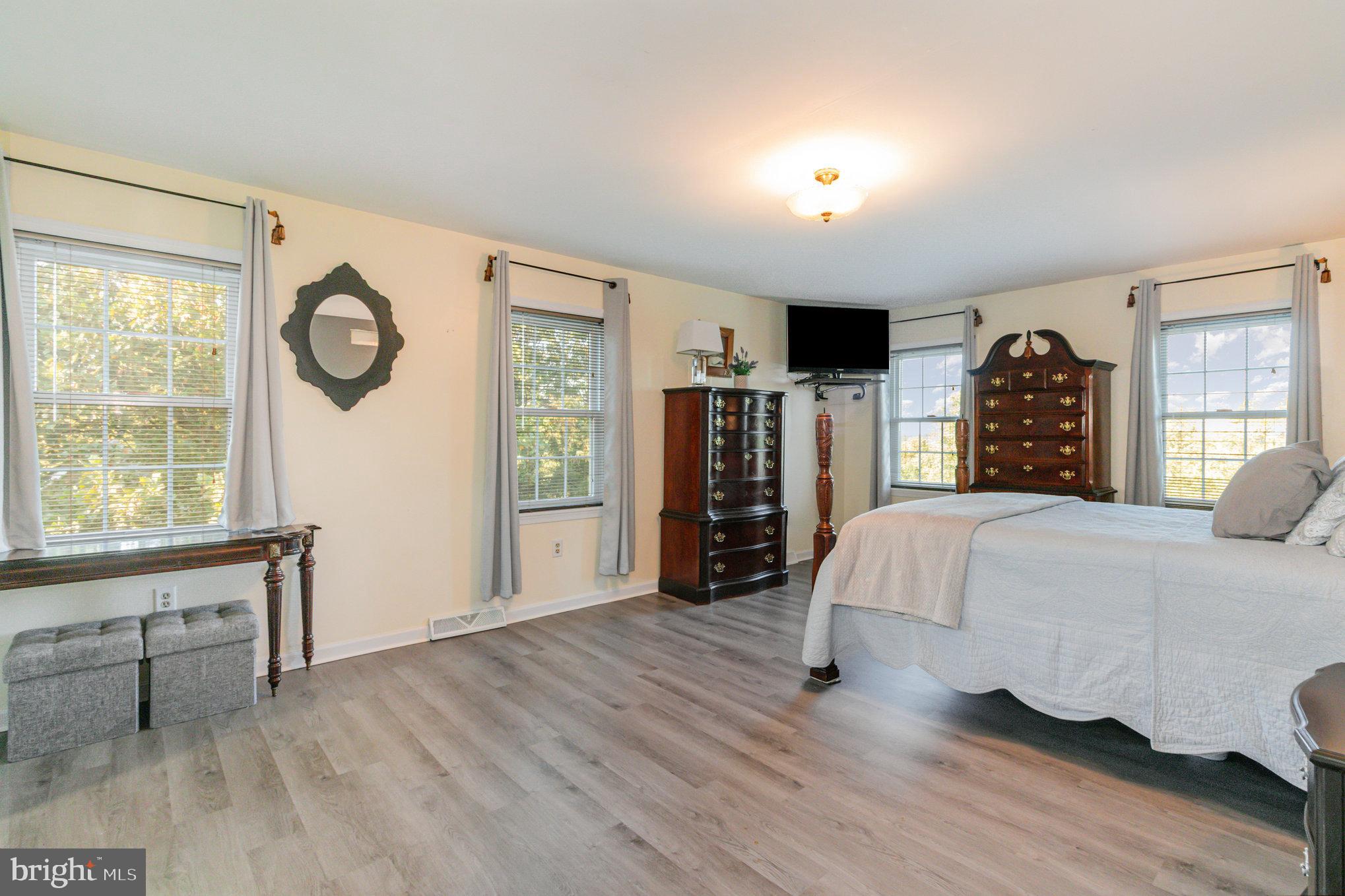 124 South Ridge Road Boiling Springs, PA 17007 - Photo 25 of 56 a bed room with a bed and a large window