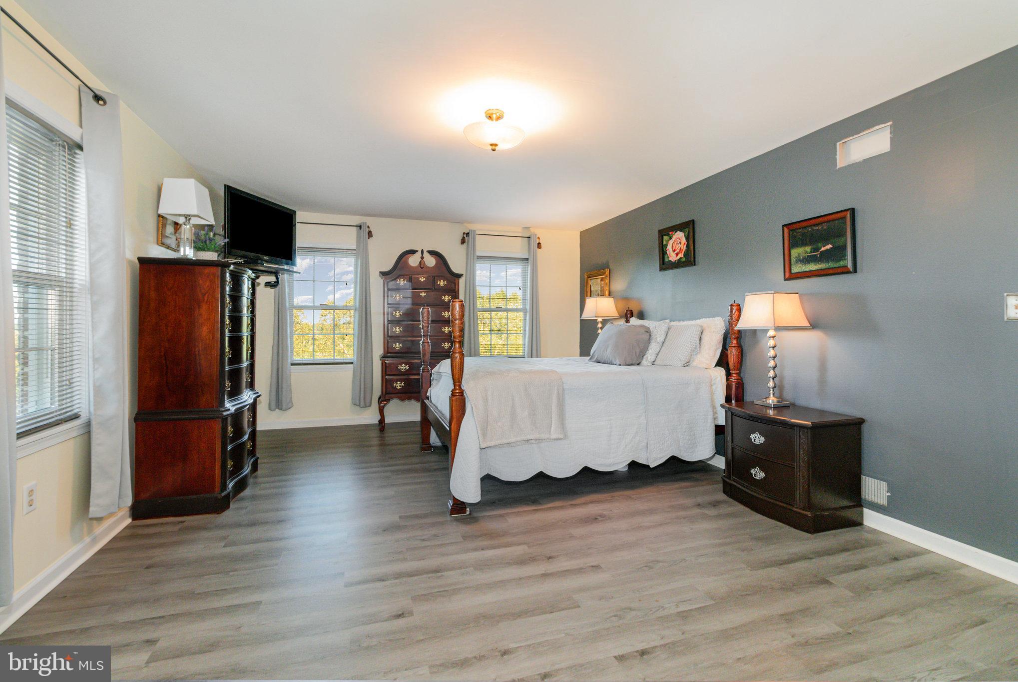 124 South Ridge Road Boiling Springs, PA 17007 - Photo 26 of 56 a bedroom with a bed and wooden floor