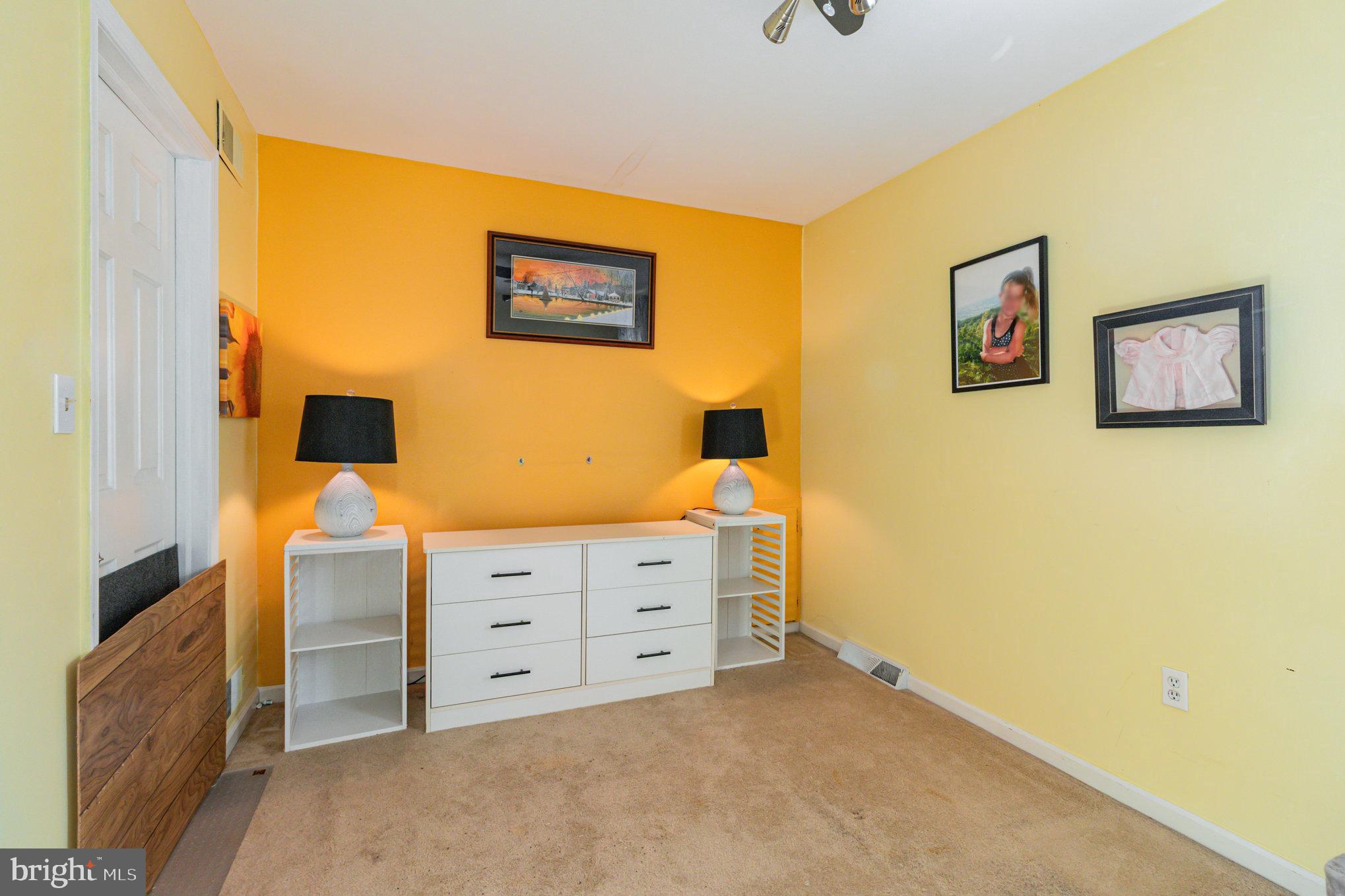 124 South Ridge Road Boiling Springs, PA 17007 - Photo 31 of 56 a spacious bedroom with a bed and a dresser