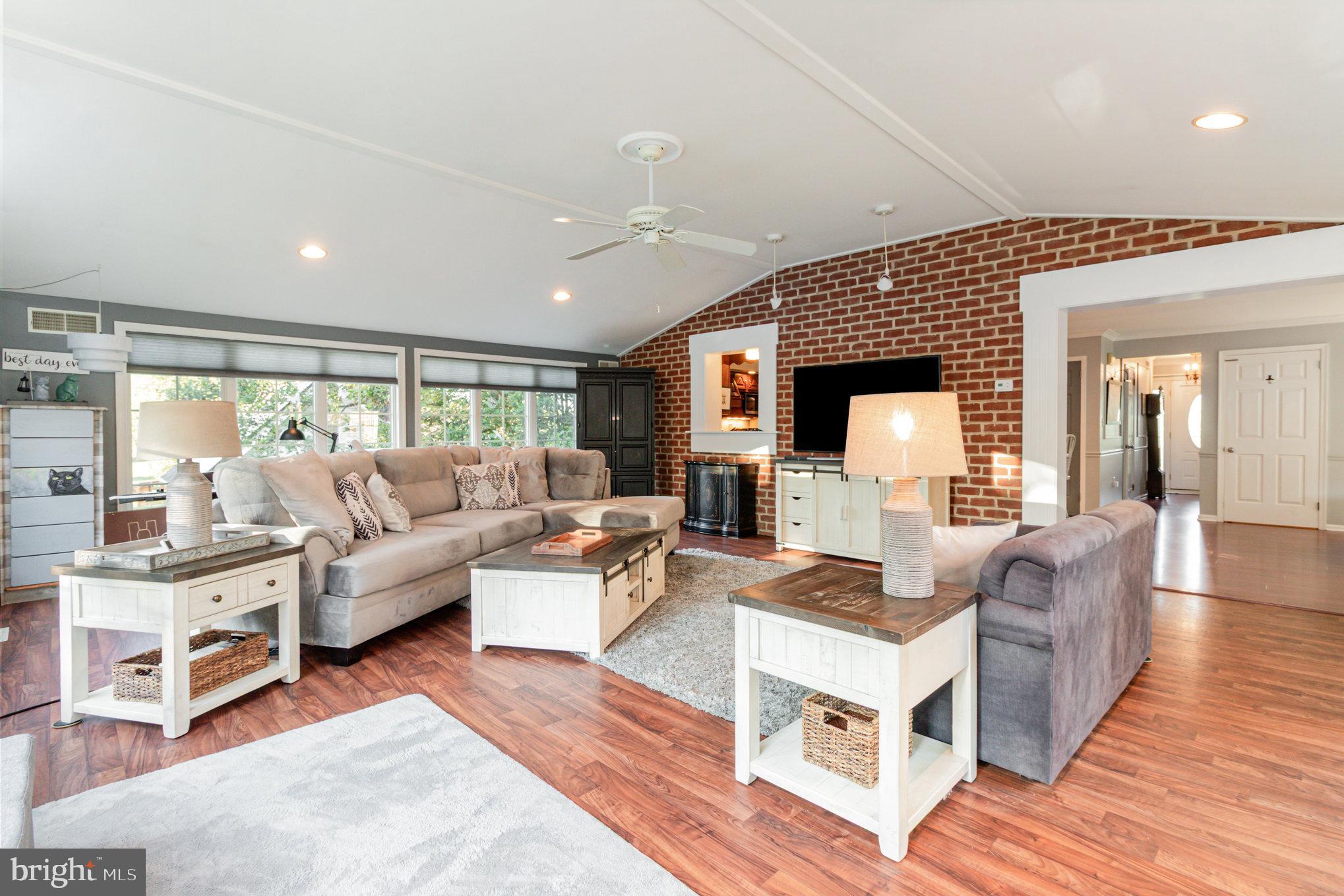 124 South Ridge Road Boiling Springs, PA 17007 - Photo 6 of 56 a living room with furniture wooden floor and a large window