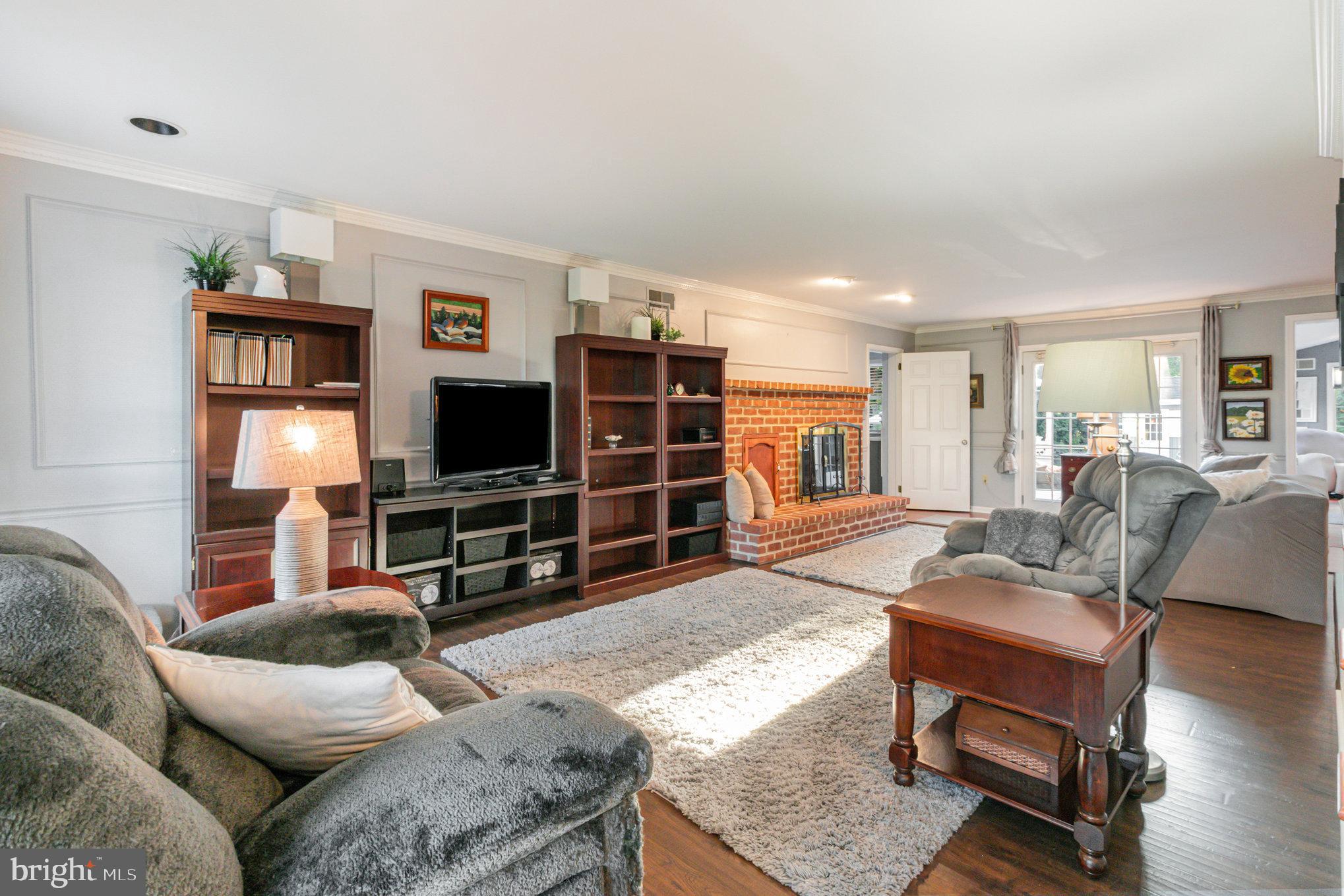 124 South Ridge Road Boiling Springs, PA 17007 - Photo 9 of 56 a living room with furniture and a flat screen tv