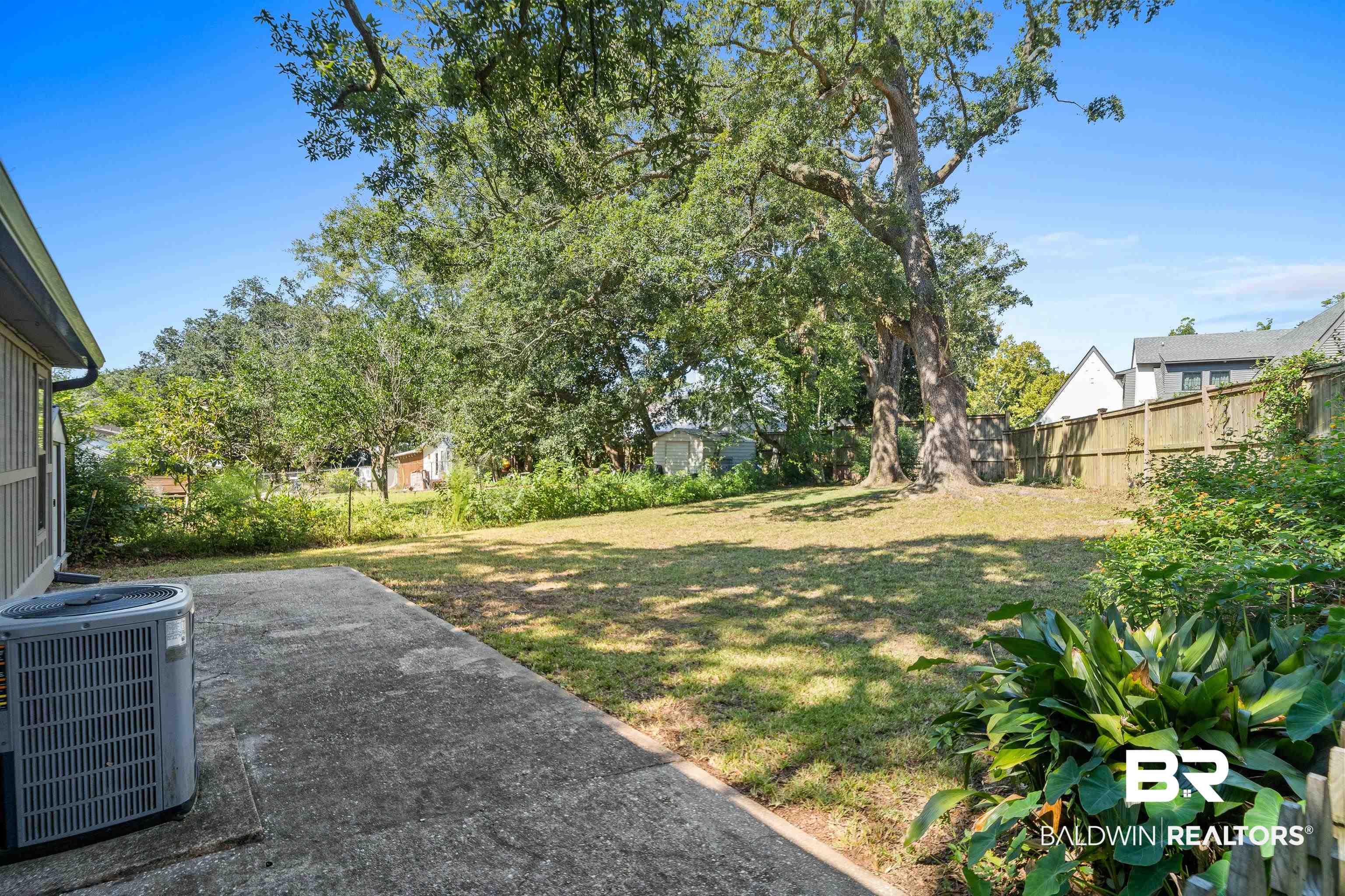 306 Liberty Street Fairhope, AL 36532 - Photo 29 of 32 Lush green back yard.