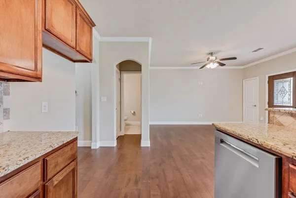 a view of a kitchen cabinets a sink and dishwasher