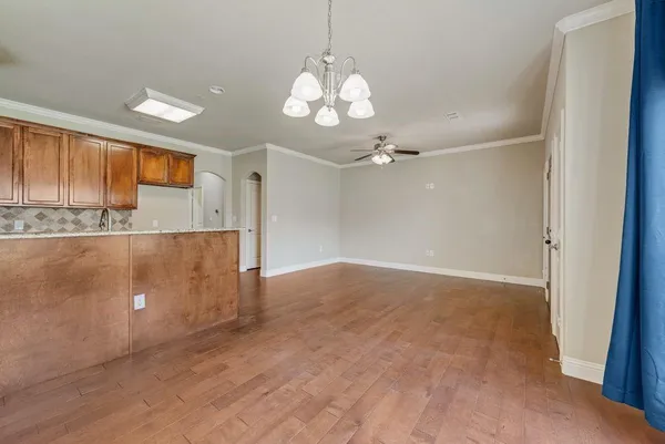 a view of a kitchen with marble kitchen and kitchen with granite countertop cabinets
