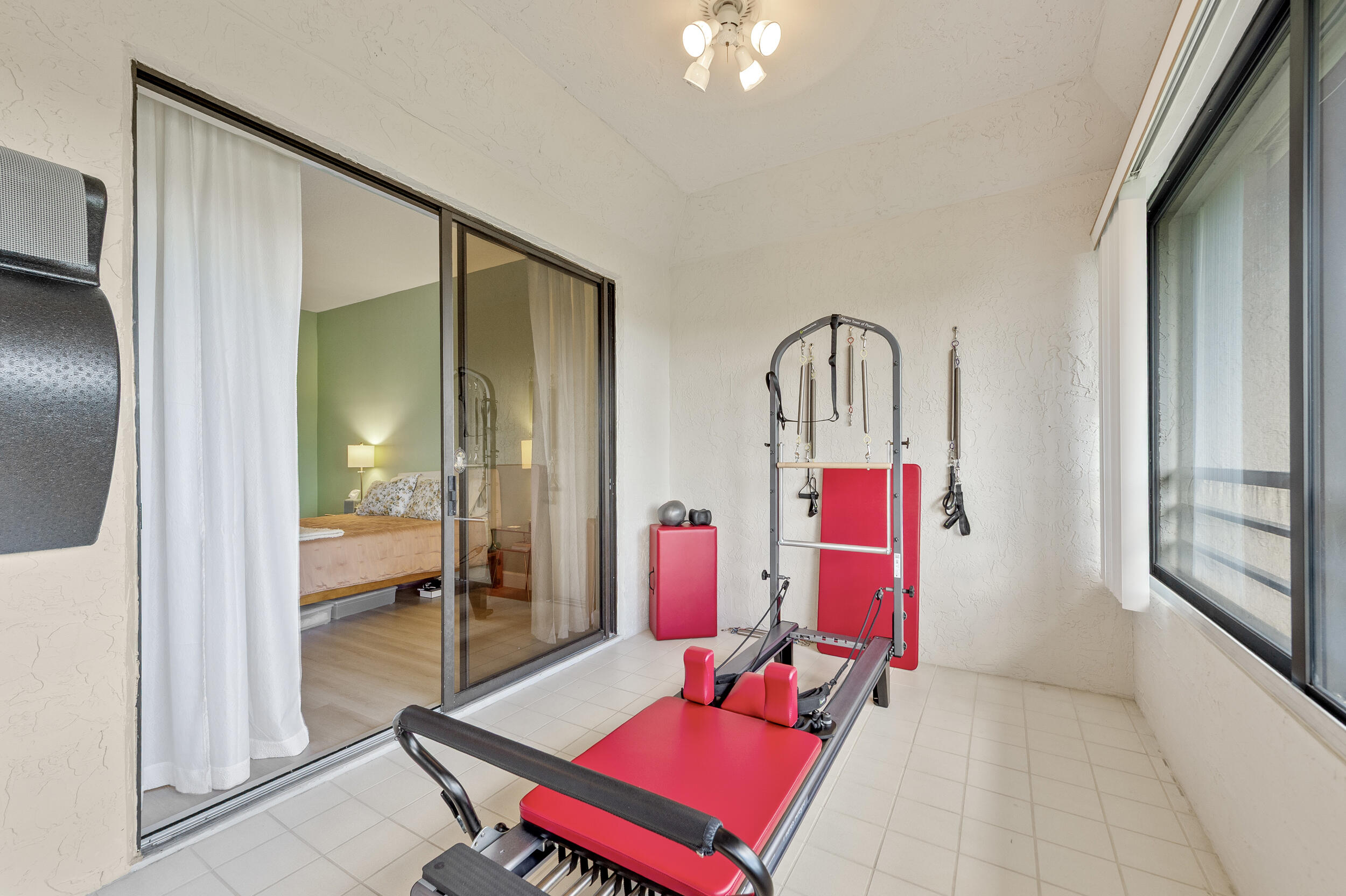 7460 La Paz Boulevard, Unit 304 Boca Raton, FL 33433 - Photo 14 of 37 a living room with furniture and wooden floor