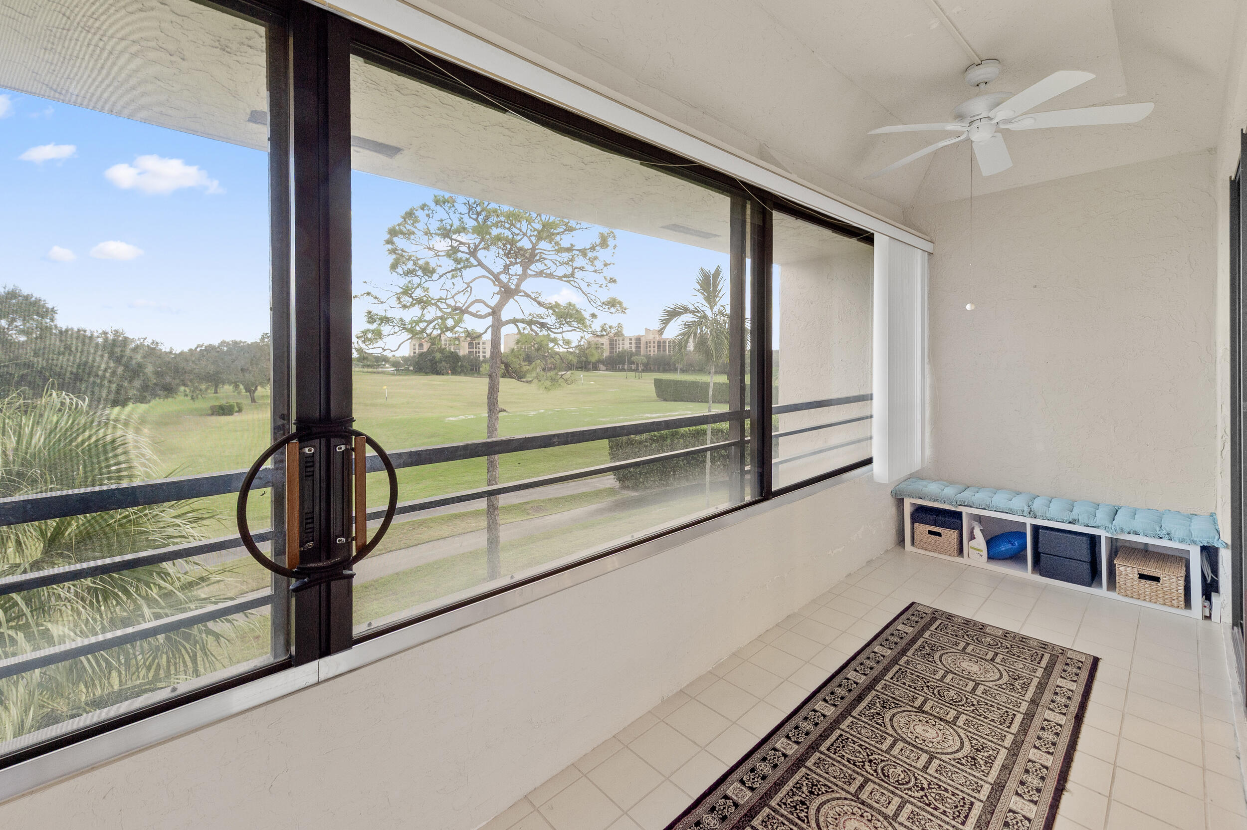 7460 La Paz Boulevard, Unit 304 Boca Raton, FL 33433 - Photo 17 of 37 a view of a floor to ceiling window with an outdoor space