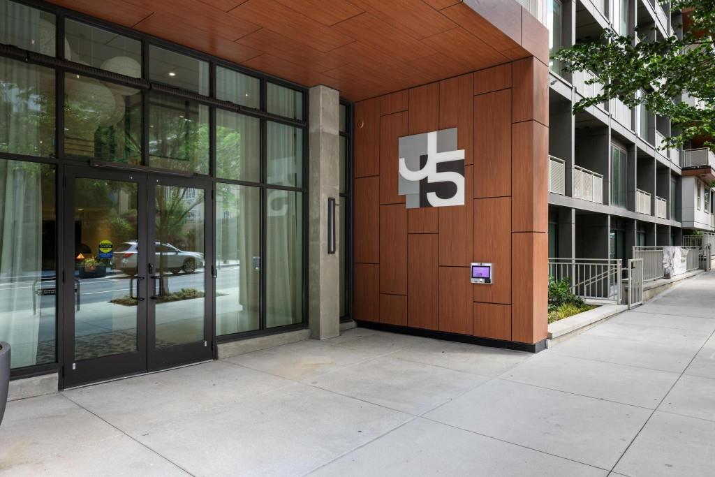775 Juniper Street Northeast, Unit 602 Atlanta, GA 30308 - Photo 2 of 40 a view of a front door of house