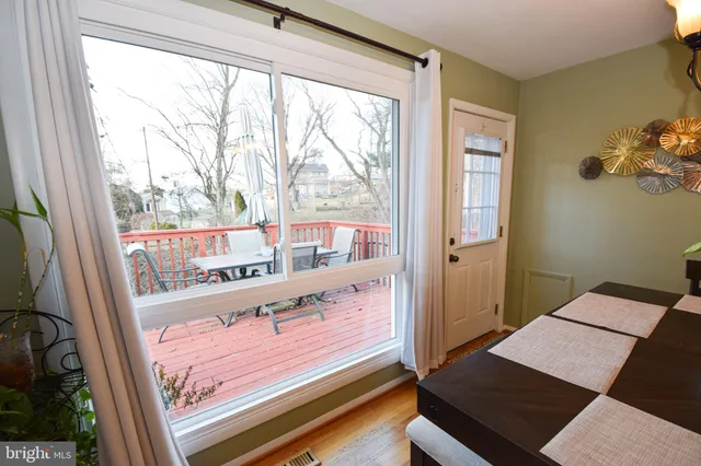 a view of a room with a large window