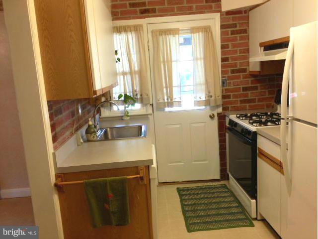8142 Glen Gary Road Baltimore, MD 21286 - Photo 8 of 20 Kitchen leads to Nice Covered Patio area