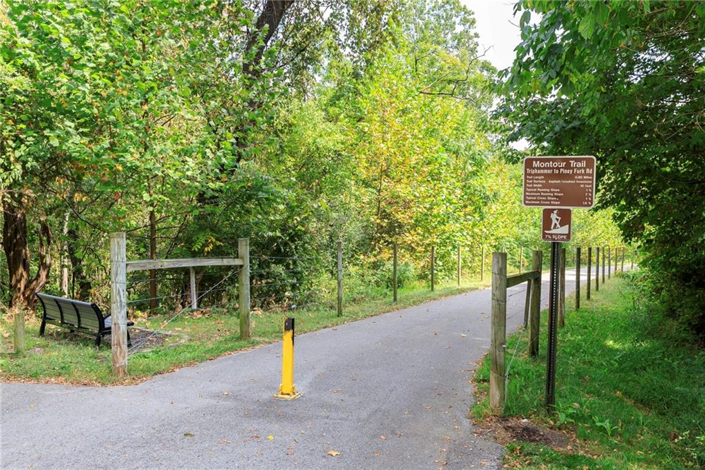 Tbd Triphammer Road South Park, PA 15129 - Photo 6 of 8 a view of a street with potted plants and large trees