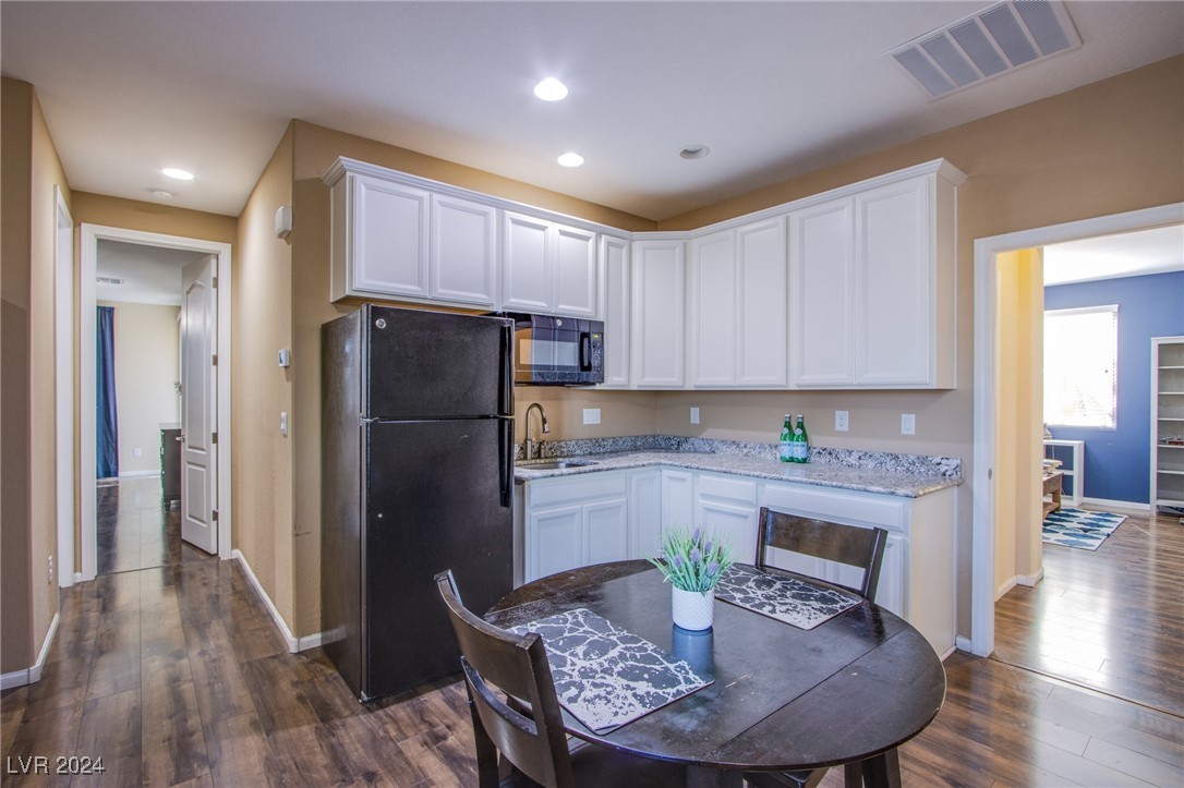 6106 Andover Wood Road Las Vegas, NV 89113 - Photo 32 of 49 View of main home entrance into casita kitchenette and dining area.