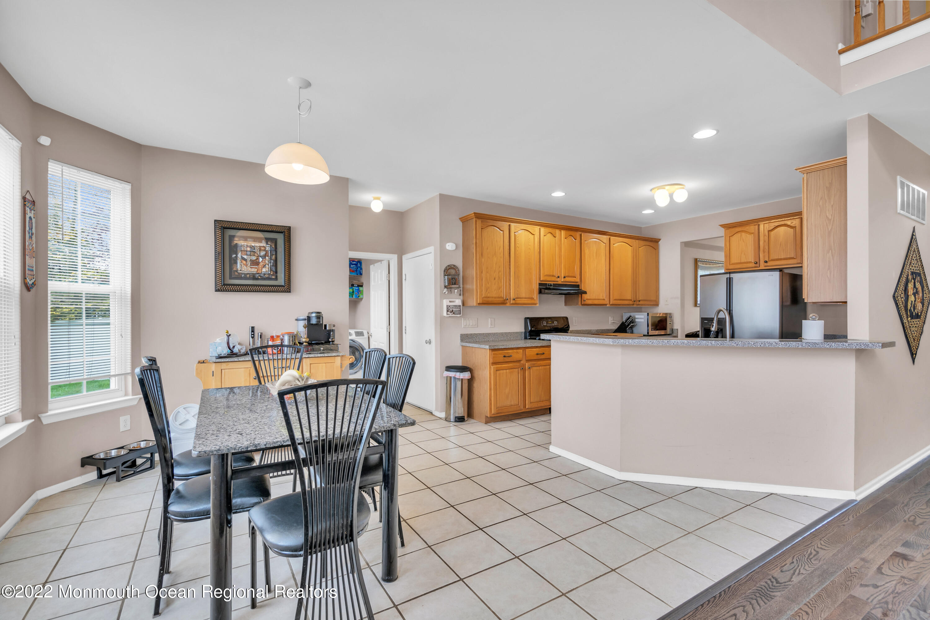 131 Nobility Court Toms River, NJ 08755 - Photo 17 of 60 a view of a dining room with furniture and a kitchen