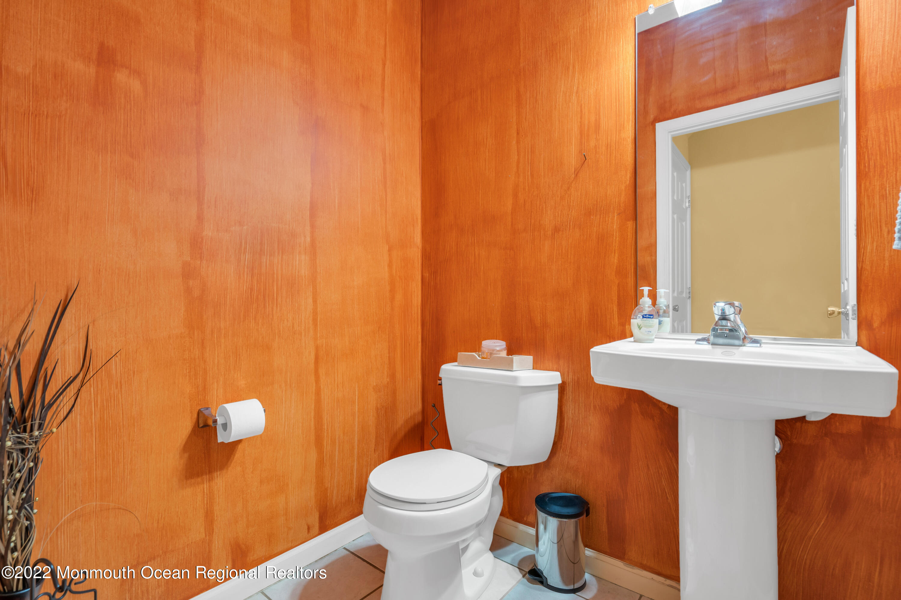 131 Nobility Court Toms River, NJ 08755 - Photo 18 of 60 a bathroom with a sink a toilet and mirror
