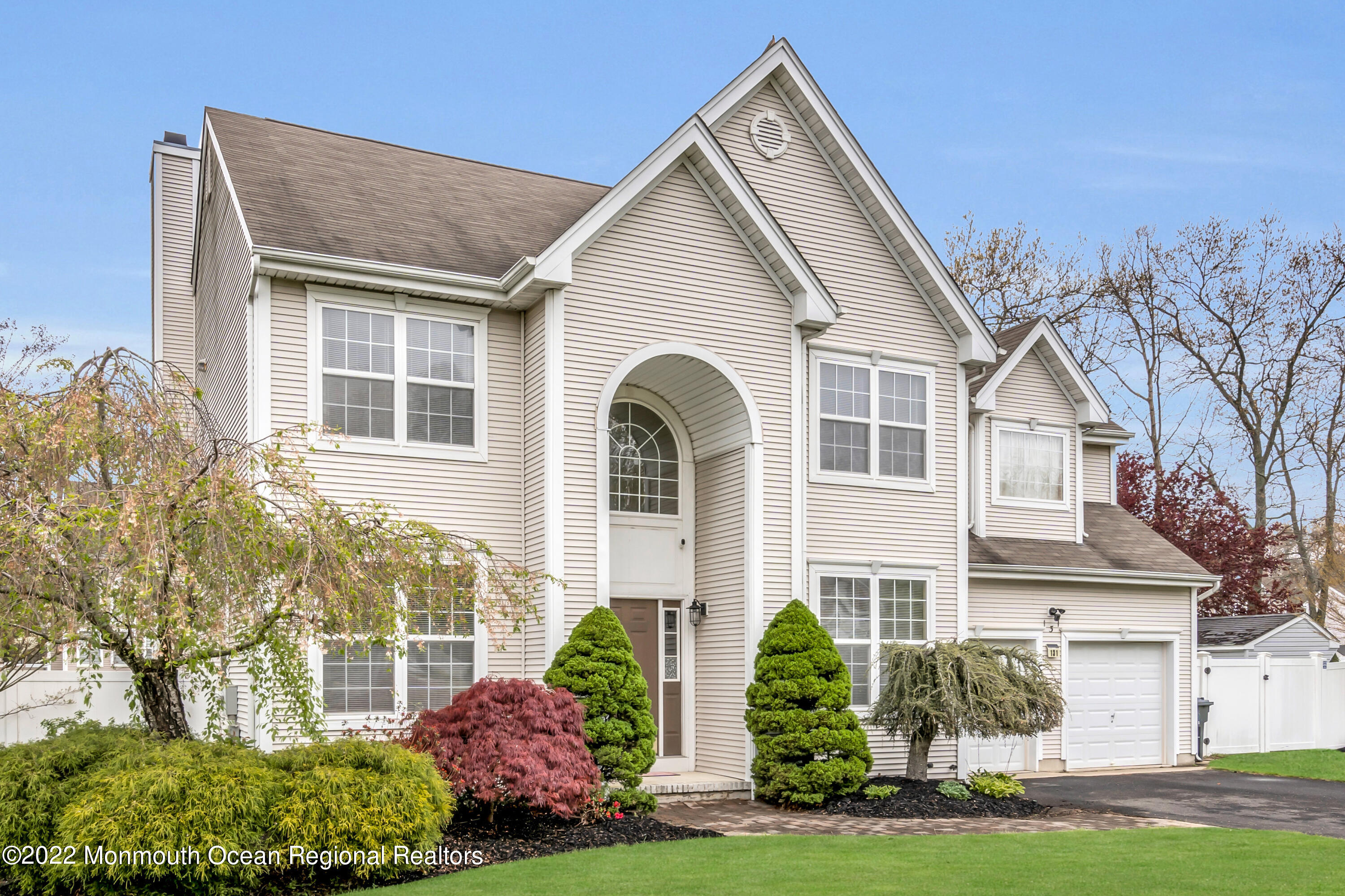 131 Nobility Court Toms River, NJ 08755 - Photo 56 of 60 a front view of a house with garden