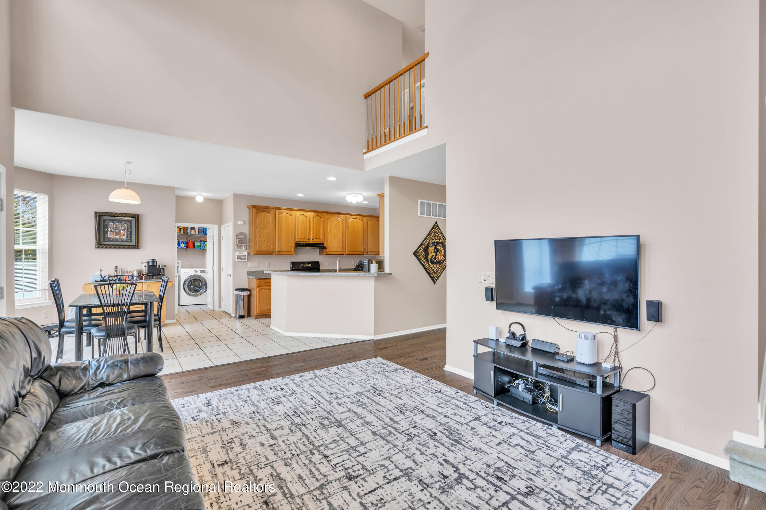 131 Nobility Court Toms River, NJ 08755 - Photo 9 of 60 a living room with furniture and a flat screen tv